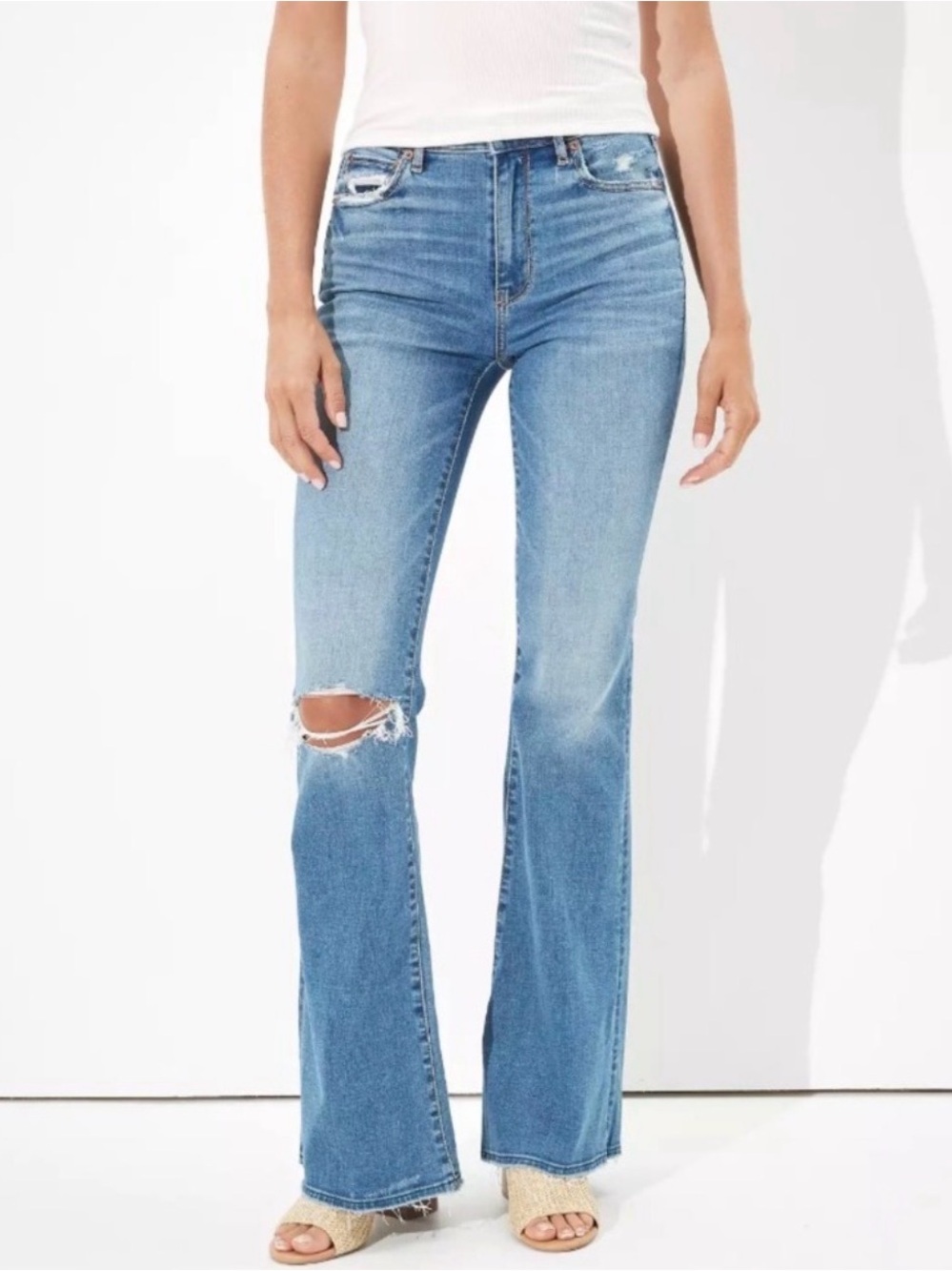 American Eagle Super Hi-Rise Flare Jeans Distressed Raw Hem